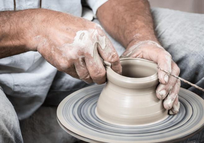 Placeholder image used to represent a person making a clay pot.